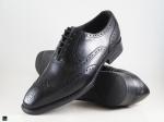 Wingtip Oxford black with flower punch - 1