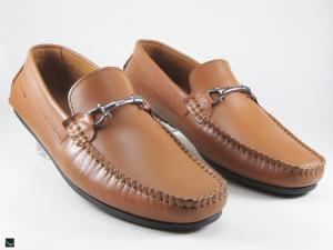 Stylish tan loafers with buckle