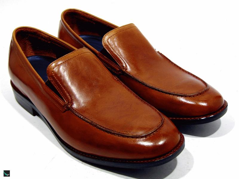 Brown leather cut shoes